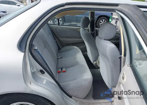 1999 Toyota Corolla Ce from USA, damaged, VIN 1NXBR12EXXZ230799